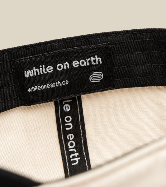 Casquette white sand/thyme While on Earth