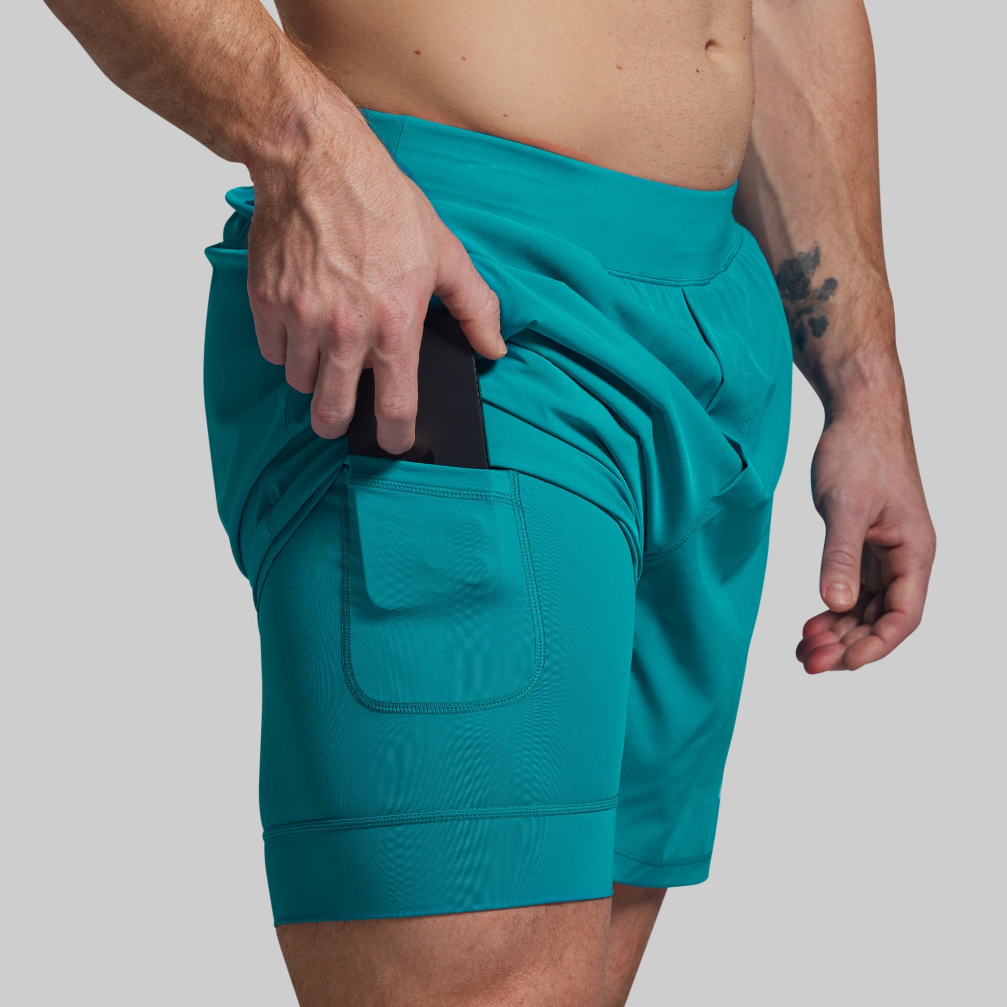 BORN PRIMITIVE-Versatile Short avec compression 7" RIPTIDE